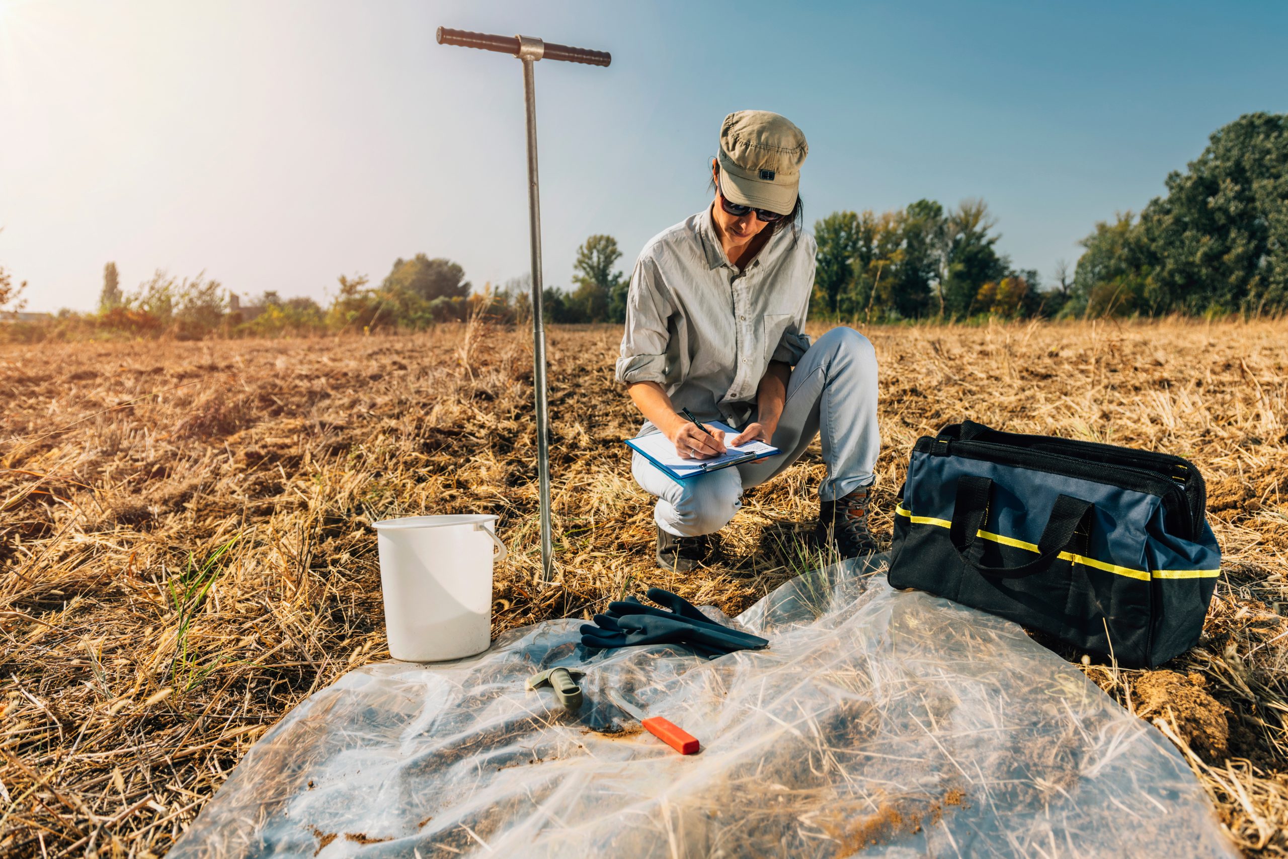 Soil,Test.,Female,Agronomist,Taking,Notes,In,The,Field.,Environmental